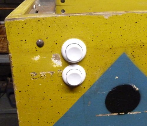 pinball button and beneath the magna save button